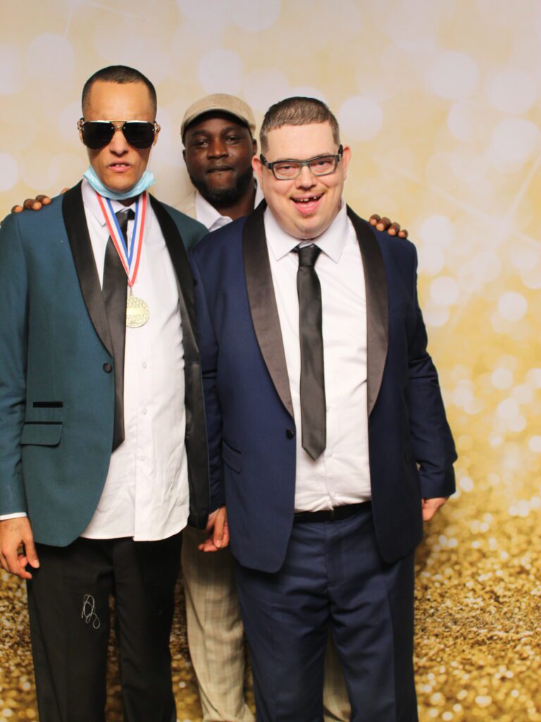 gold sparkle backdrop at photo booth event