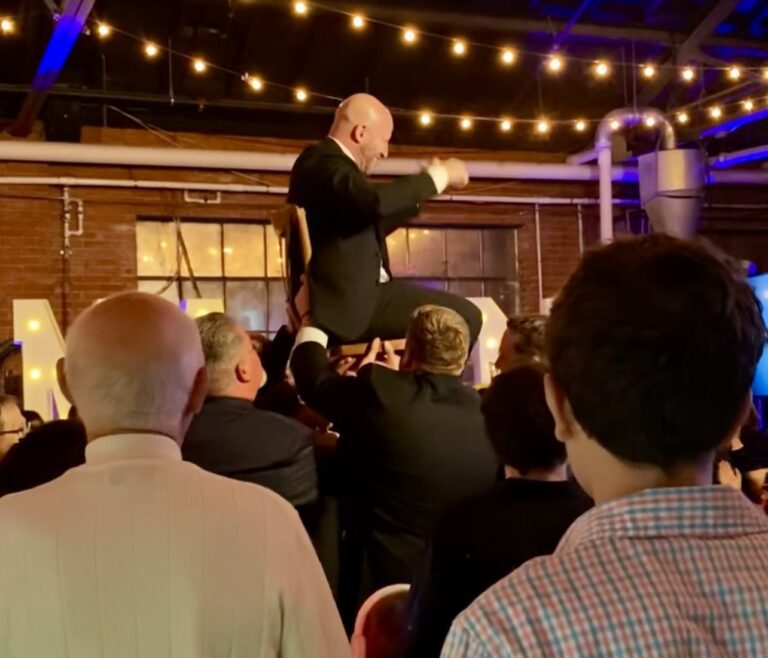 Traditional chair lift at bar mitzvah at McClintock Distilling