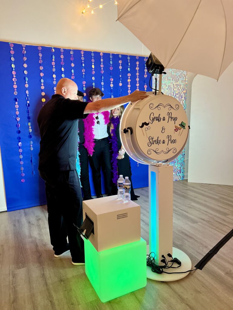 kids posing at photo booth