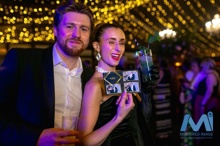 guest posing with 4x6" print