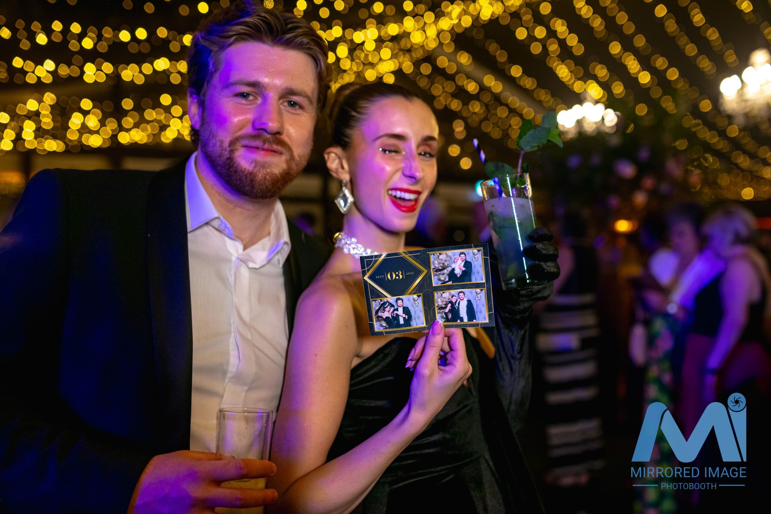 guest posing with 4x6" print