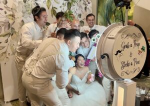 guests posing in front of venue pro